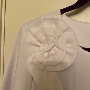 Knit flower accent blouse